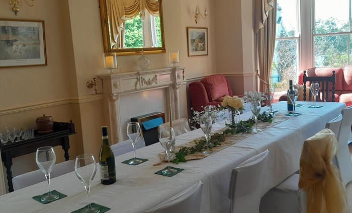 This is a versatile space that can be set up as a meeting/training room, dining/event space, or with comfortable sofas and chairs for relaxation.
